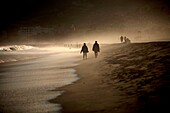 A couple walks in a beach in San Jose del Cabo,Baja California,Mexico.