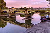 England,Ricgmond-Upon-Thames. River Thames at low tide and Twickenham railway Bridge