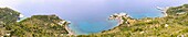 West coast panorama with Valsamo Beach and shipyard town of Agios Isidoros near Kallithea on the island of Samos in Greece