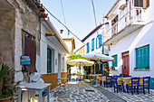 Alley with taverns in the mountain village of Vourliotes in the north of the island of Samos in Greece