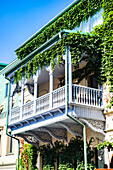 Carving balconies in Old town of Tbilisi cityin sunny summer day