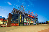 Manchester United Football Club Old Trafford at night, Manchester, England, United Kingdom, Europe