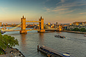 View of Tower Bridge and River Thames from Cheval Three Quays at sunset, London, England, United Kingdom, Europe
