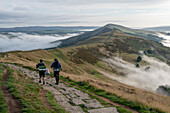 Walkers on The Great Ridge with cloud inversion, Edale, The Peak District, Derbyshire, England, United Kingdom, Europe