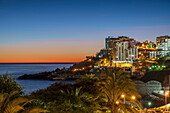 Hotels on the coastline at twilight, Funchal, Madeira island, Portugal, Atlantic, Europe