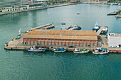 Spain, Barcelona, Barceloneta, Fishing boats moored at harbor
