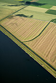 Netherlands, Zuid-Holland, Kats, Aerial view of rural landscape and sea