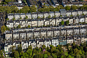 UK, London, Aerial view of rows of Victorian townhouses in Holland Park