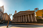 Low angle view of exterior of Buenos Aires Metropolitan Cathedral with traffic on street