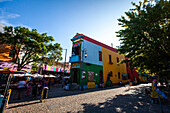 View of tourist at Caminito street museum and traditional alley, La Boca