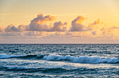 USA, Florida, Boca Raton, Sea waves and clouds at sunrise
