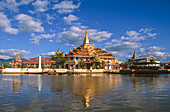 Myanmar, Shan State, Inle Lake, Buddhist temple reflecting in lake