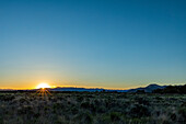 USA, Idaho, Bellevue, Sun setting over plains