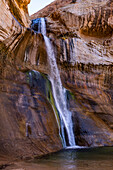 United States, Utah, Escalante, Waterfall in rocky terrain
