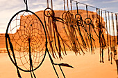 USA, Utah, Dream catchers with Elephant Butte in background in Monument Valley Tribal Park