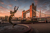 View of Tower Bridge, Girl with Dolphin, The Shard and River Thames at sunrise, London, England, United Kingdom, Europe