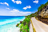 Crystal clear blue ocean side driving along the road on Bonaire, Netherlands Antilles, Caribbean, Central America