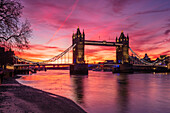 Sunrise view of Tower Bridge from Tower Wharf, Tower of London, London, England, United Kingdom, Europe