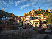 View of the Sulfur Baths with Narikala Fortress at sunrise, Tbilisi, Georgia (Sakartvelo), Central Asia, Asia