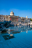 View of The National Gallery and fountains in Trafalgar Square, Westminster, London, England, United Kingdom, Europe