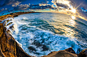 Sunset and waves at Sunset Cliffs in San Diego, CA
