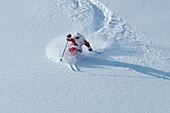 Santa Skiing at Snowbird Ski Resort, Wasatch Mountains, Utah. (MR)