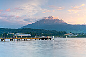 Boat dock on Lake Lucerne with Pilatus mountain massif