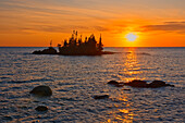 Canada, Ontario, Lake Superior Provincial Park. Islands in Lake Superior at sunrise.