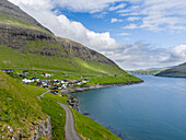 Bour (Boeur), A Traditional Village At Sorvagsfjordur, In The Background Village Sorvagur Island Vagar, Part Of The Faroe Islands In The North Atlantic. Denmark