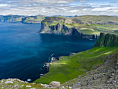 View Over Settlement Vikar Towards Streymoy. Mountains Of Island Vagar, Part Of The Faroe Islands. Denmark, Faroe Islands