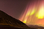 Europe, North Iceland, Near Akureyri. Northern Lights glowing.