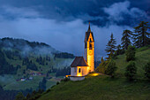 Italy, Dolomites, Val di Funes. Chapel of St. Barbara at sunset