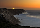 Cabo de Sao Vincente (Cape St. Vincent) with its lighthouse at the rocky coast of the Algarve in Portugal.