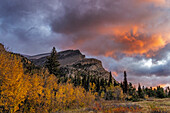 Sunrise clouds over Bear Mountain in Glacier National Park, Montana, USA
