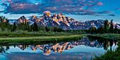 Grand Teton National Park, panoramic reflection of Teton Mountains near Jackson Hole, Wyoming