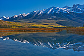 Canada, Alberta, Jasper National Park. Mountains reflected in Talbot Lake.