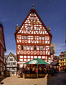 Restaurant in a half-timbered house with outdoor dining, Limburg an der Lahn, Hesse, Germany