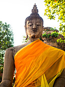 Thailand, Ayutthaya, Buddha Draped with Orange