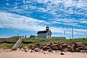 Canada, Prince Edward Island. Cousin's Shore Beach, lighthouse