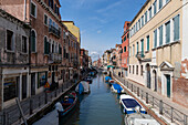 Rio di Sant'Anna perspective with moored boats, Venice, Veneto, Italy