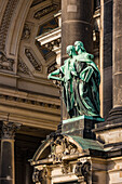 Statues of Luke and John as evangelists at Berlin Cathedral, Germany