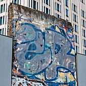 A painted piece of the Berlin Wall on display at Potsdamer Platz in Berlin, Germany