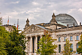 Lettering Dem Deutschen Volke on the Reichstag with dome, Berlin, Germany