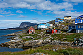 Greenland. Itilleq. Colorful houses dot the hillside.
