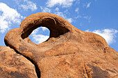 USA, California, Sierra Nevada Range. The eye of Cyclops Arch in Alabama Hills