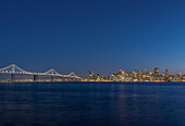 USA, California, San Francisco, Bay Bridge & Downtown Skyline at Twilight