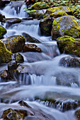 USA, Oregon, Columbia River Gorge, Water Cascading over Rocks at Punchbowl Falls