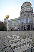The depiction of the sun and sundial is the start of the Plantetenweg, inner courtyard of the Deutsches Museum, Munich, Bavaria, Germany