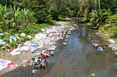 Rio Grande with women washing clothes on the island of São Tomé in West Africa