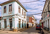 Rua de Moçambique with old colonial buildings in São Tomé on the island of São Tomé in West Africa